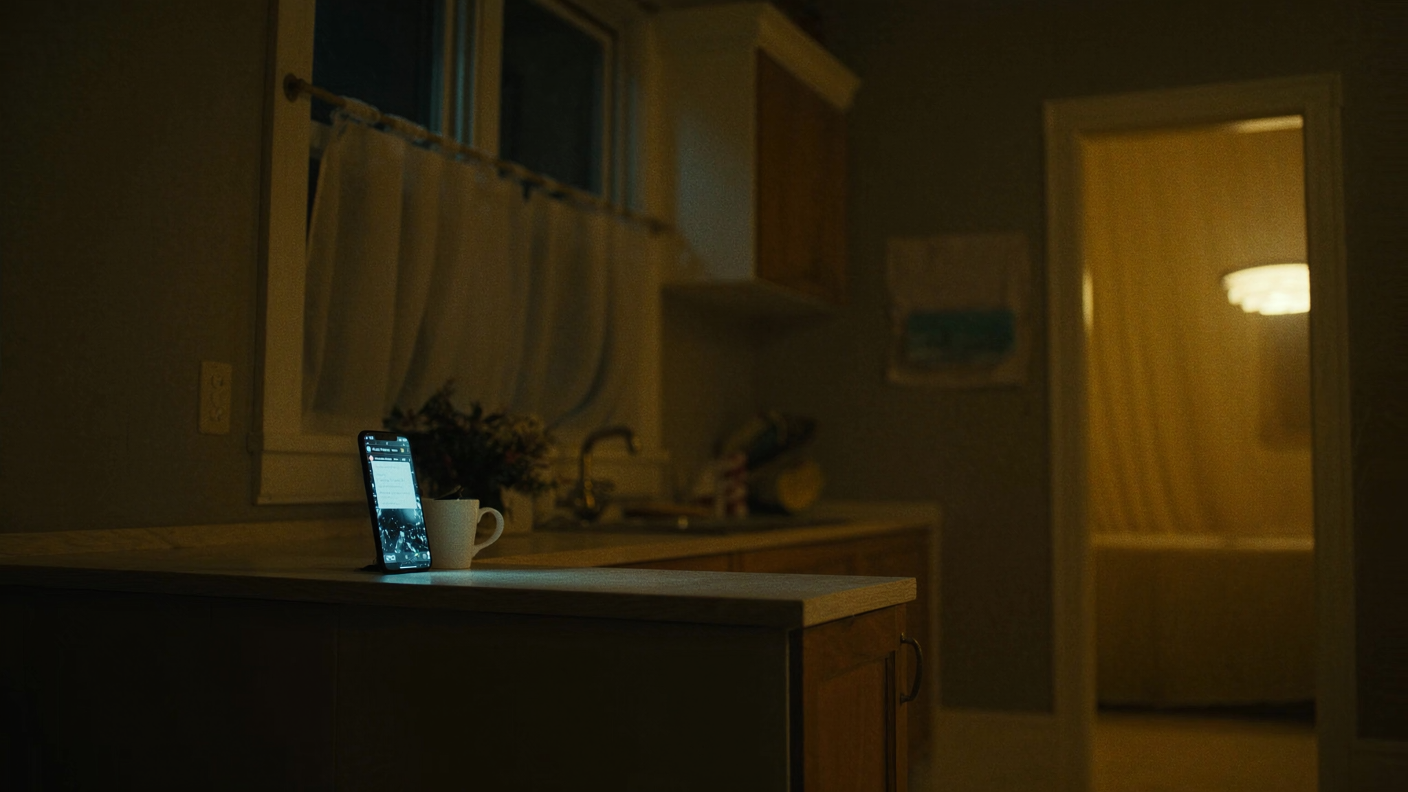 Smartphone on a counter at night, representing online dental appointment booking